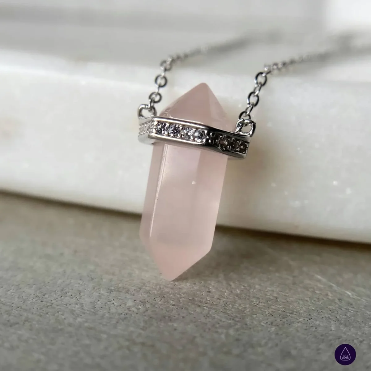 Made with genuine silver 925, this necklace features a beautiful rose quartz point pendant that exudes natural beauty and feminine charm.