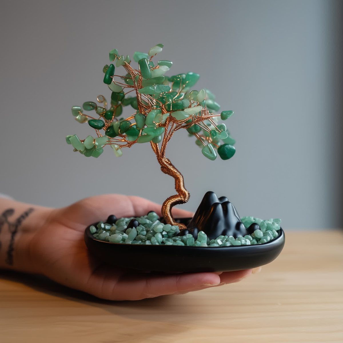 model hand holding Feng shui jade crystal tree for luck and harmony, perfect spiritual gift