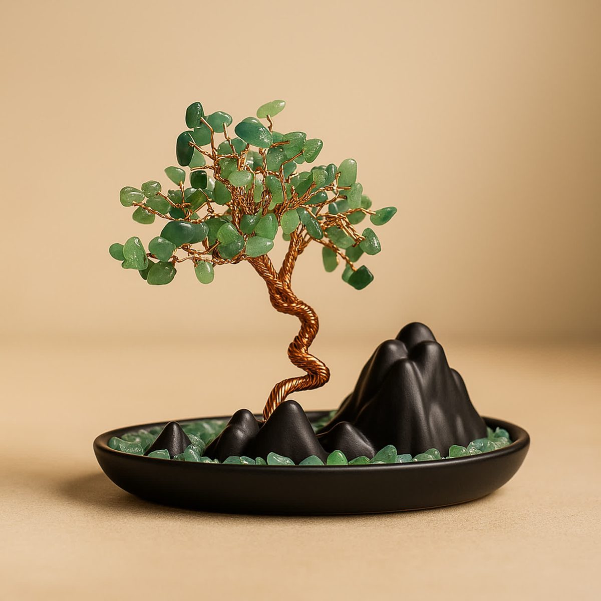 Green jade bonsai tree crystal with copper wire branches on black ceramic dish