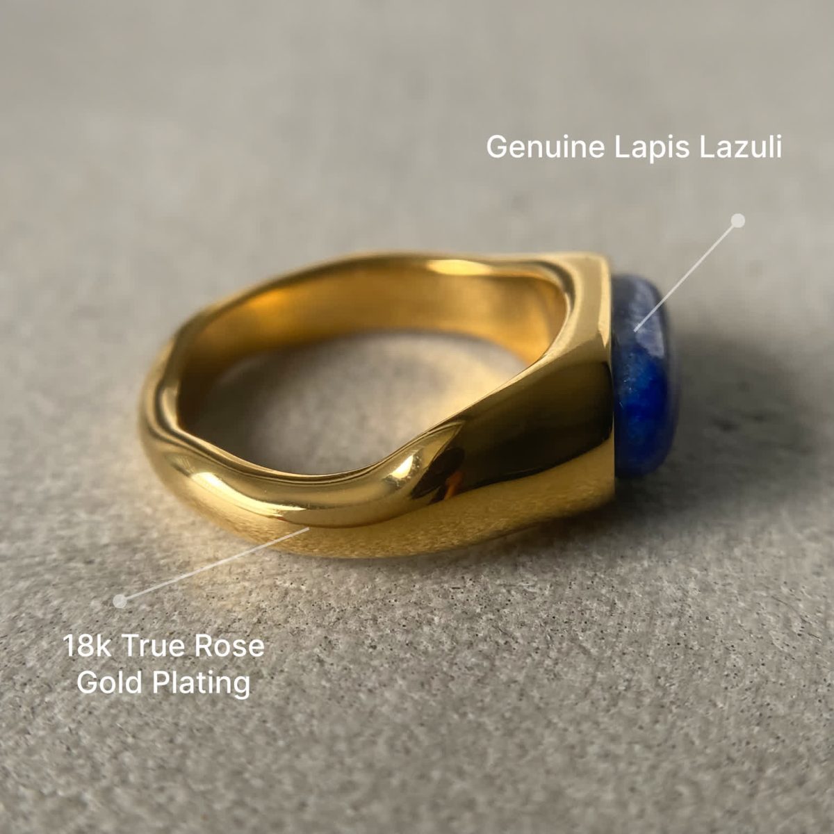 Side profile of blue stone ring with genuine lapis lazuli and thick gold band.